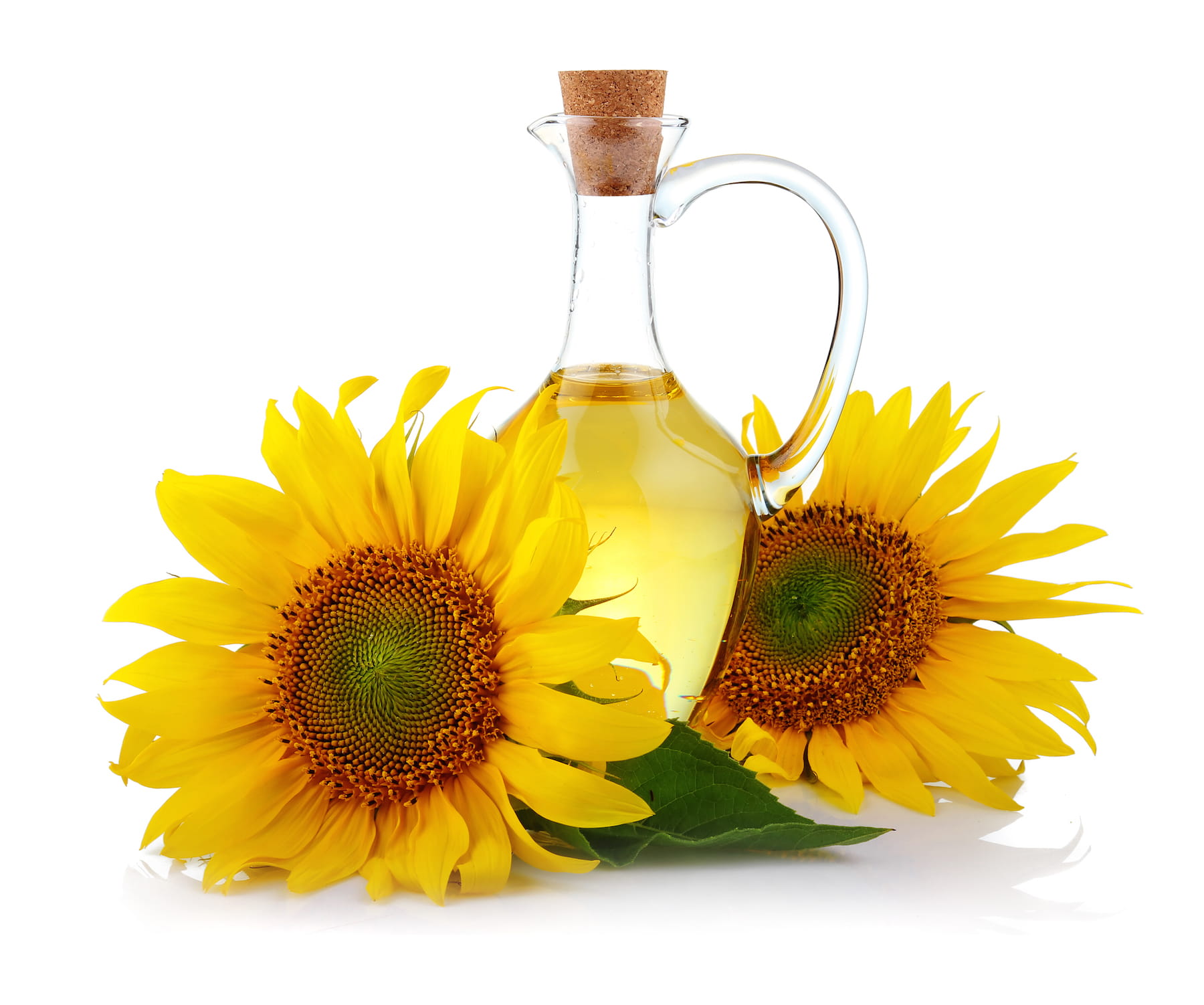 Jug of sunflower oil with flowers isolated on white background