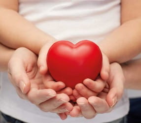 stock-photo-people-charity-family-and-advertisement-concept-close-up-of-woman-and-girl-holding-red-heart-260177180