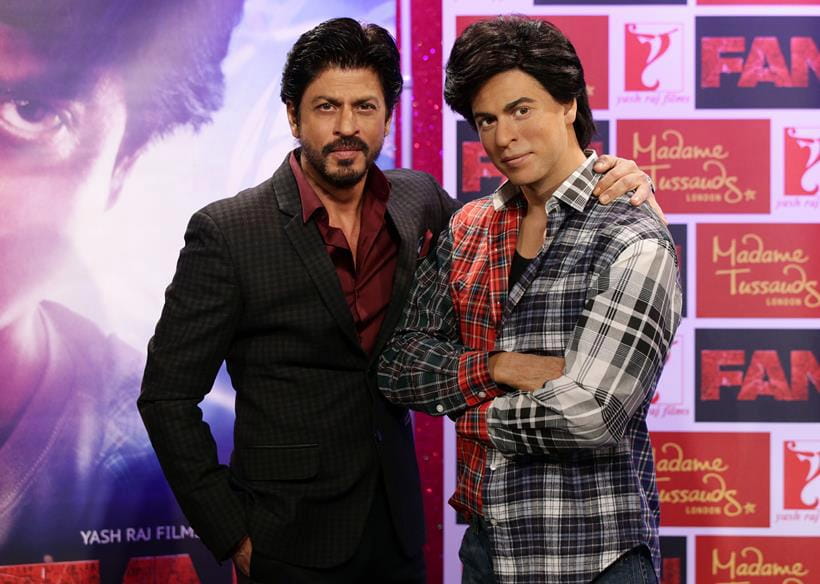 Bollywood star Shah Rukh Khan poses with his wax figure at Madame Tussauds in London, Wednesday April 13, 2016. (Yui Mok/PA via AP) UNITED KINGDOM OUT NO SALES NO ARCHIVE