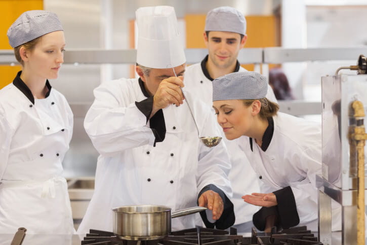 student-tasting-head-chefs-soup