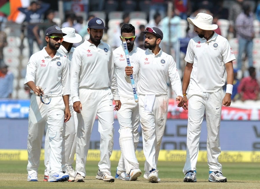 India's captain Virat Kohli (centre R) with teammates celebrate after winning a solo Test match against Bangladesh at the Rajiv Gandhi International Cricket Stadium on February 13, 2017. IMAGE RESTRICTED TO EDITORIAL USE - STRICTLY NO COMMERCIAL USE----- / GETTYOUT / AFP PHOTO / NOAH SEELAM / ----IMAGE RESTRICTED TO EDITORIAL USE - STRICTLY NO COMMERCIAL USE----- / GETTYOUT