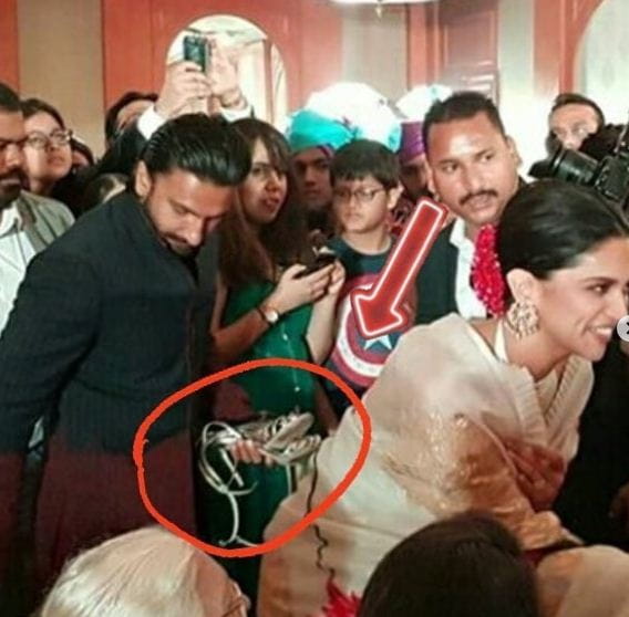 Ranveer Singh Carries Deepika Padukone’s Footwear