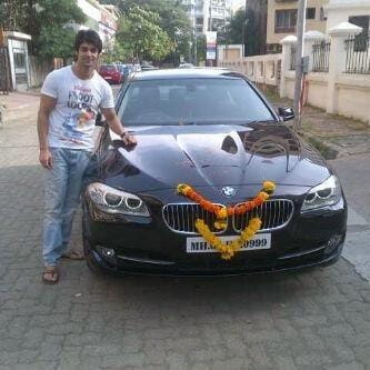 karan wahi with his luxury was BMW