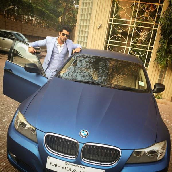 Gautam Gulati with his luxury car BMW
