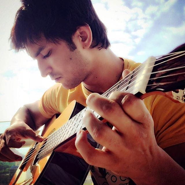 Sushant Singh Rajput playing guitar