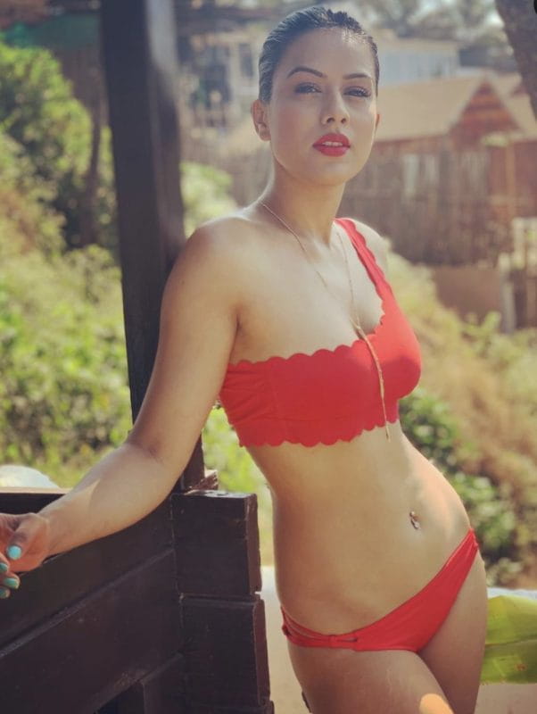Nia Sharma Hot in red bikini