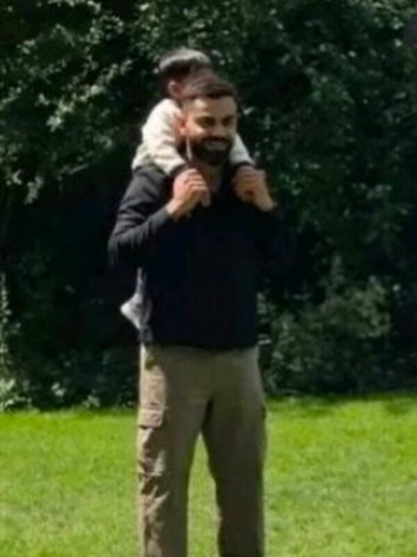 Virat Kohli gwith his baby boy Akaay